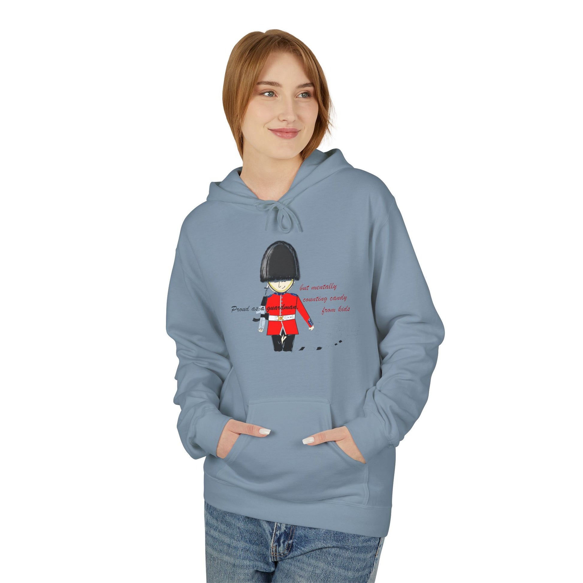 Person wearing a blue hoodie with a playful royal guardsman graphic design on a white background