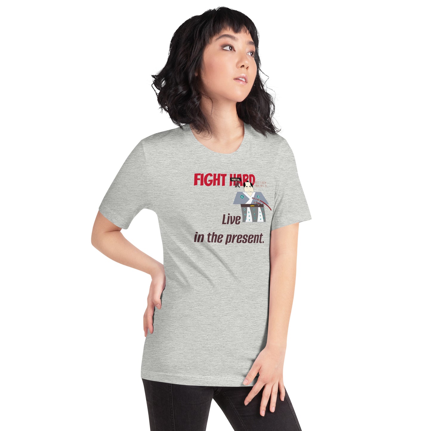Person wearing a gray t-shirt with a playful samurai graphic and motivational quote on a white background