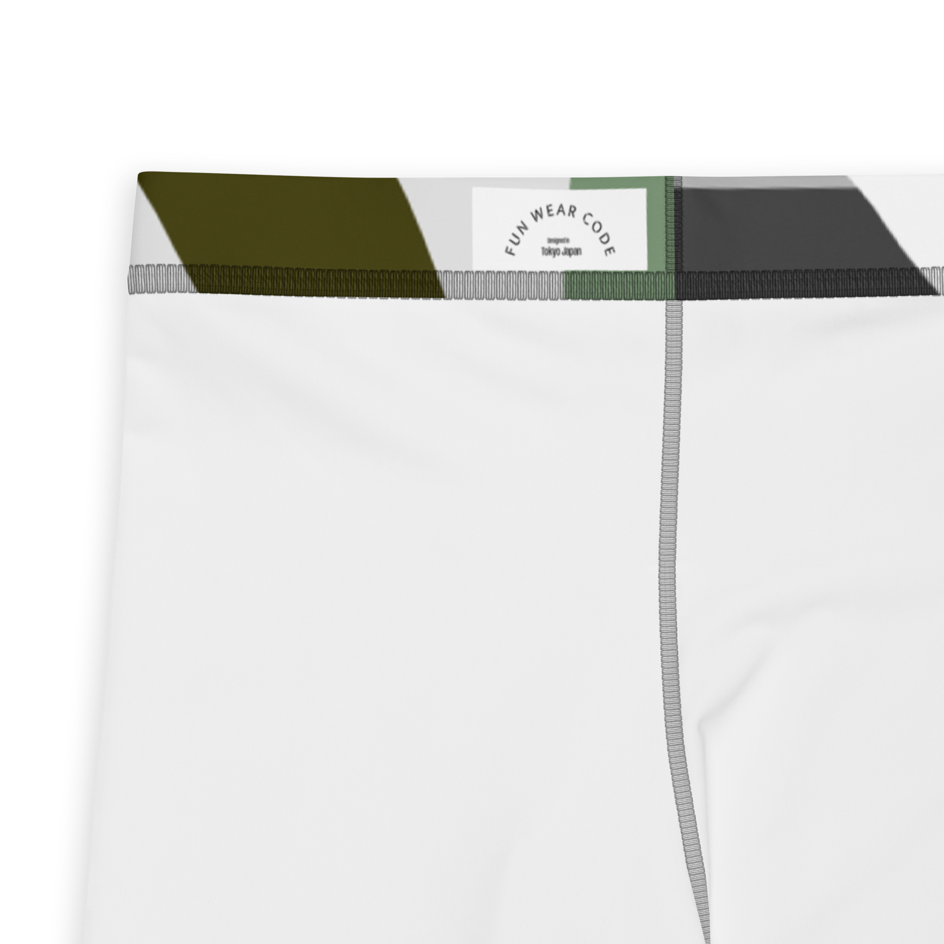 Close-up of a white athletic leggings with a brand label 'Funwearcode', with green and black trim on a white background