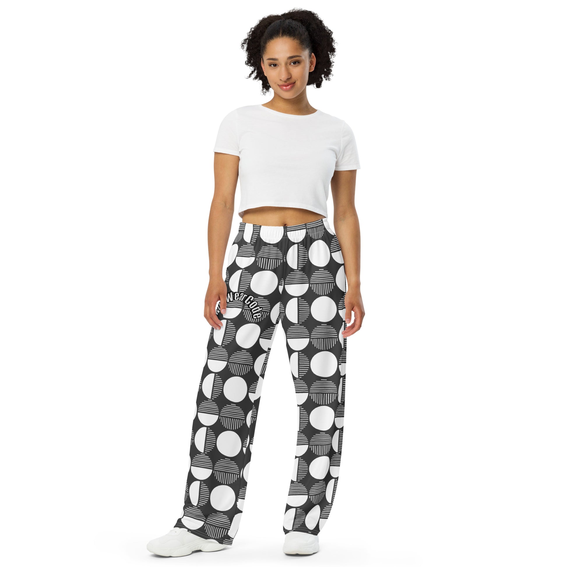 Woman wearing a white crop top and patterned pants with a 'Fun Wear Code' text logo on a white background